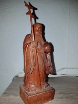 Wooden Asian figure in Ramstein, Germany