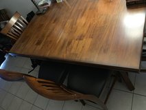 Counter height, expandable table, comfortably sits (6) with chairs in Fort Benning, Georgia
