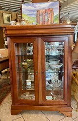 timeless cherry wood display cabinet with hidden drawer in Spangdahlem, Germany