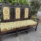 one of a kind bench with ornate grape carvings in Ramstein, Germany