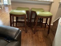 Four bar height bar stools in Kingwood, Texas