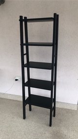 tall black wooden shelf in Clarksville, Tennessee