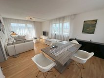 AGRA | Bright furnished apartment with large balcony above the roofs of Kaiserslautern in Ramstein, Germany