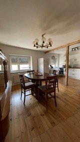 Wooden dining table with 4 matching chairs in Ramstein, Germany