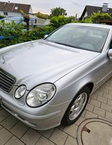 Mercedes E200 Kompressor w/ 4 snow tires on Mercedes rims in Wiesbaden, GE