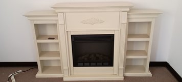 Nice fireplace with bookcases in Alamogordo, New Mexico