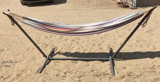Double cotton hammock with a sturdy frame. in Yucca Valley, California