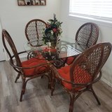 Dining Set - beautiful rattan table and chairs with glass top in Alamogordo, New Mexico
