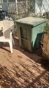 Two large trash bins on wheels in Alamogordo, New Mexico