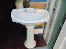 Pedestal Sink with Faucet Handles in Oswego, Illinois