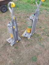 2 Dyson vacuum cleaners with attachments, good working order in Lakenheath, UK