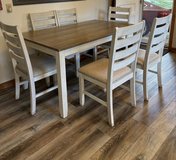 Dining table with 6 apholstered chairs in Pleasant View, Tennessee