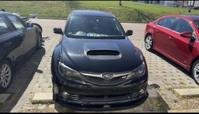 Right hand drive Japanese 2010 Subaru STI hatchback in Stuttgart, GE