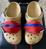 Tan Crocs with zippered pouch Jibbitz in Okinawa, Japan