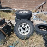 GM/Chevrolet stock mag rims with tires in Alamogordo, New Mexico