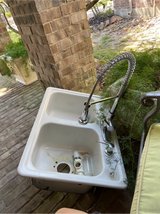sink with faucet and soap dispenser in Kingwood, Texas