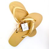 Basic Flip Flops, Sz 10 New - yellow gold tone in Oswego, Illinois