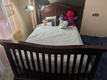 Full-sized wood platform bed frame in Bolingbrook, Illinois