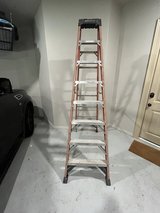 Werner 8-ft ( 12-ft Reach Height ) Fiberglass step ladder in Kingwood, Texas