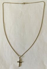 Gold cross and chain in Lakenheath, UK