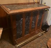 wood bar with 2 bar chairs in Fort Carson, Colorado