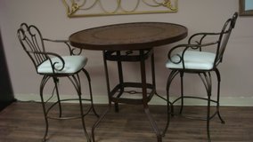 High top Patio table with 2 swivel high chars in Fort Bliss, Texas