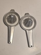 Pair of Vintage Metal Hand Citrus Juicers in Houston, Texas