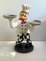 Italian chef figurine holding pizza pans, kitchen bistro decor. in Chicago, Illinois