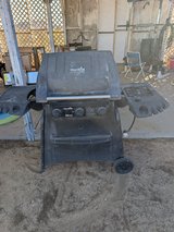 Propane grill and propane holder in Yucca Valley, California