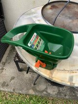 Handheld fertilizer spreader in Okinawa, Japan