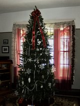 6' tall slim Christmas tree with stand in Naperville, Illinois
