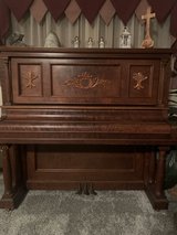 Antique piano in Kingwood, Texas