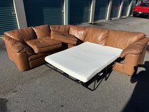 Leather Sectional Couch With Sleeper in Perry, Georgia