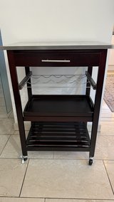 Dark wood rolling trolley cart with stainless steel top in Ramstein, Germany