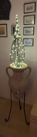 big cactus with lights terracotta vase statue in Stuttgart, GE