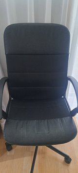 Black chair in fair condition in Okinawa, Japan