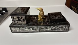 Vintage mechanical cigarette dispenser in Byron, Georgia