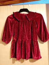 Girls red velvet dress in Lakenheath, UK