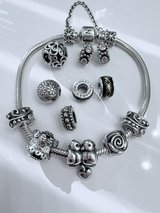 Pandora clasp bracelet with charms in Perry, Georgia