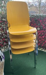 4 yellow chairs in Ramstein, Germany