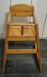 Wooden children's high chair in Ramstein, Germany