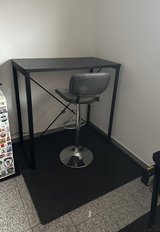 Desk, chair and floor matting in Ramstein, Germany