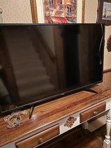 Toshiba 50” smart tv and remote control in Plainfield, Illinois
