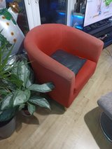 red tub chair in Lakenheath, UK