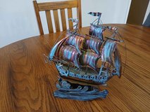 ship , that winds up plays music and goes back and forth in Alamogordo, New Mexico