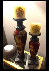 Beautiful candle holder set. They have a high gloss to them. Burgundy with gold decor. The talle... in Fort Campbell, Kentucky