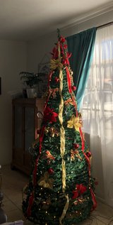 Christmas Tree 6 1/2 ft pop up Tree in Alamogordo, New Mexico
