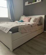 Queen size bed with storage space smoker and pet free I can delivery and set up in Ramstein, Germany