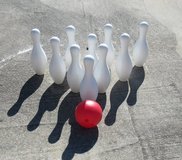 bowling ball game/ have 19 pins n 2balls/ lack one pin to be 2 full sets in Warner Robins, Georgia