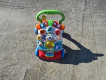 training push walker n play center electronics work in Byron, Georgia